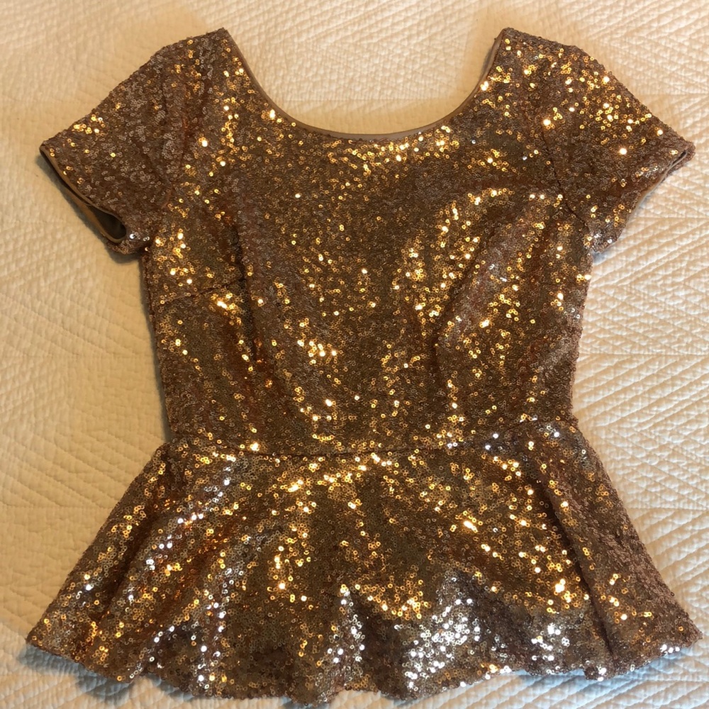 Sequin peplum top size small
